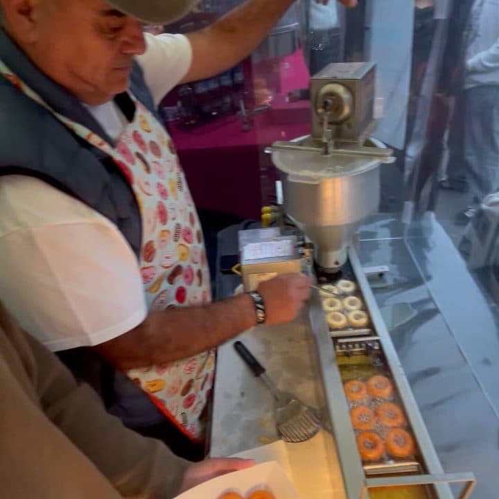 Working the fryer under the tent.